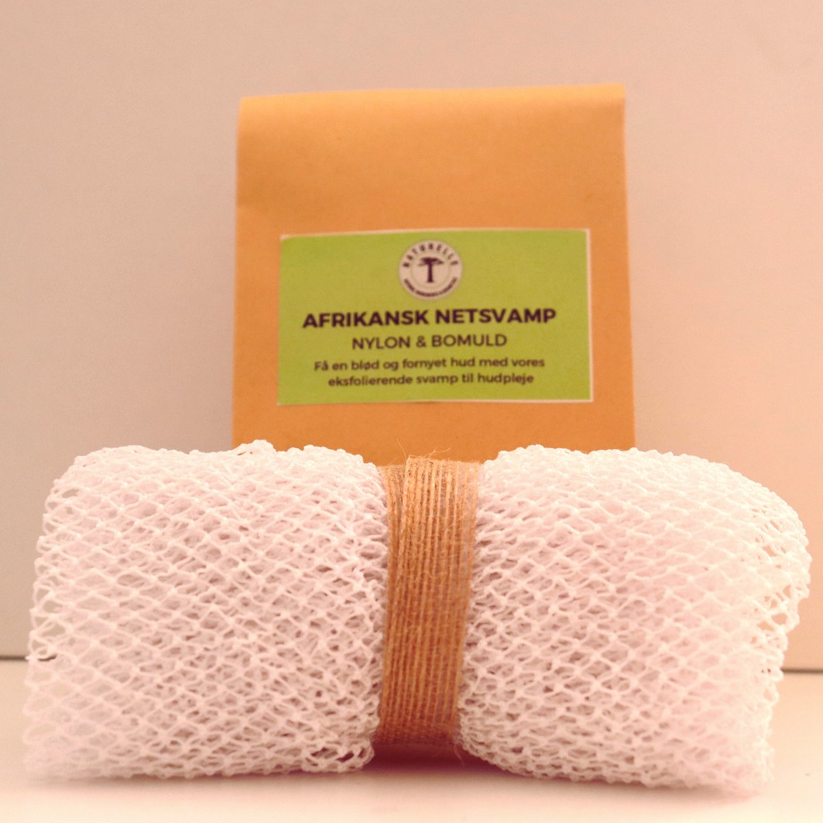 Afrikansk netsvamp i nylon og bomuld til eksfoliering af hud - Hvid - Naturelle.dk