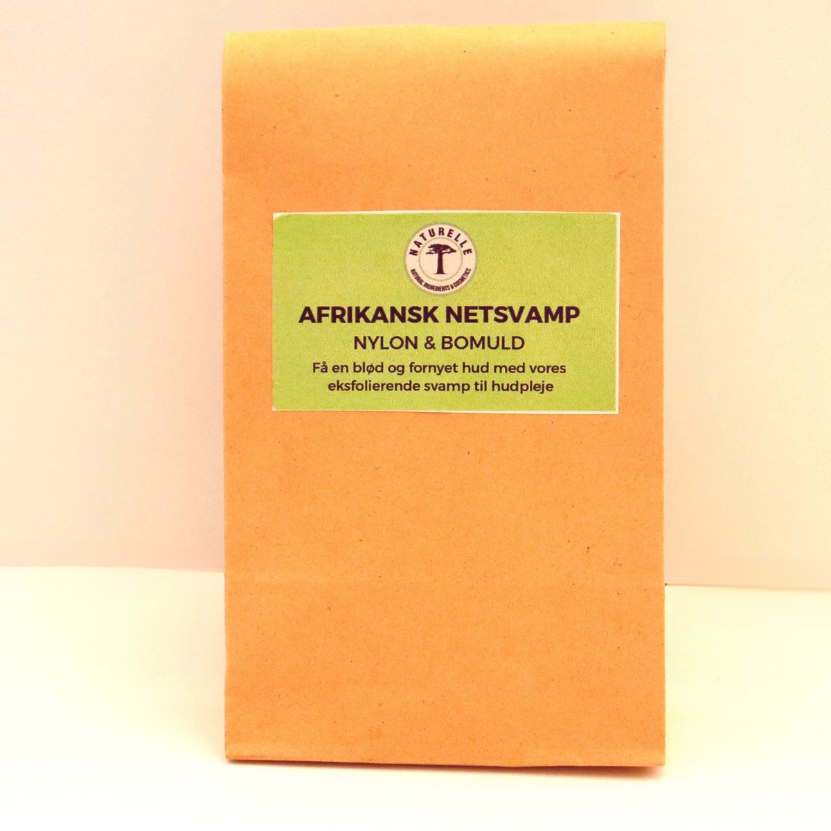 Afrikansk netsvamp i nylon og bomuld til eksfoliering af hud - orange - Naturelle.dk