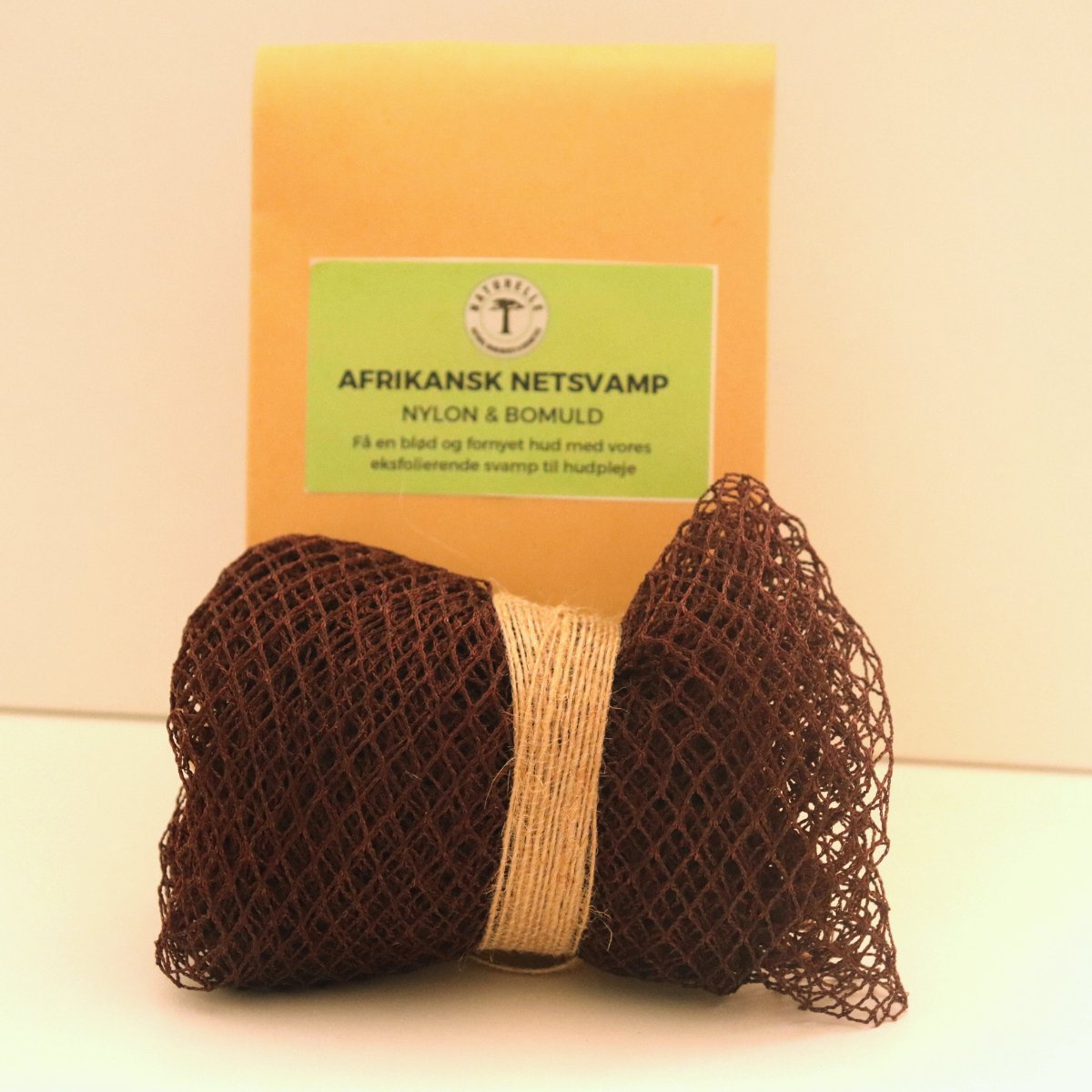 Afrikansk svamp i nylon og bomuld til eksfoliering af hud - Brun - Naturelle.dk